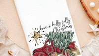 have a holly jolly Christmas throw pillows for couch, red truck Christmas kitchen towels for friends, Christmas gifts for new homeowners