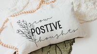 Grow positive thoughts throw pillow 