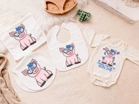 CapableByDesign pig baby bodysuit, bib, peanut burp cloth, and carry with me lovey blanket