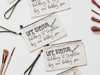life status makeup bag