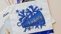 personalized 2026 cheer tote bag with name, blue school spirit cheer squad gifts, travel cheer bag for girls, cheerleader gifts from coach