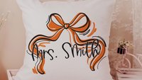 personalized fall coquette throw pillow with name, orange bow accent pillow for chair, fall housewarming gift for her, autumn decor cute