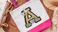 personalized gold coquette initial tote bag with name, school spirit gear, cheer tote bag for girls, college student gift, cheerleader gifts
