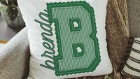 personalized kelly green initial pillow for dorm room, college student gift, seersucker stripe throw pillow with name on it, school spirit