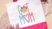 cat mom tote for her, cute cat gifts for women, colorful cat paw print tote bag for cat lover, popular now cat mama gifts, cat beach bag
