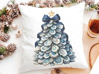 CapableByDesign oyster shell Christmas tree with navy bow pillows and matching towels