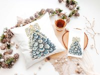 CapableByDesign oyster shell Christmas tree with polka dot bow pillows and matching towels