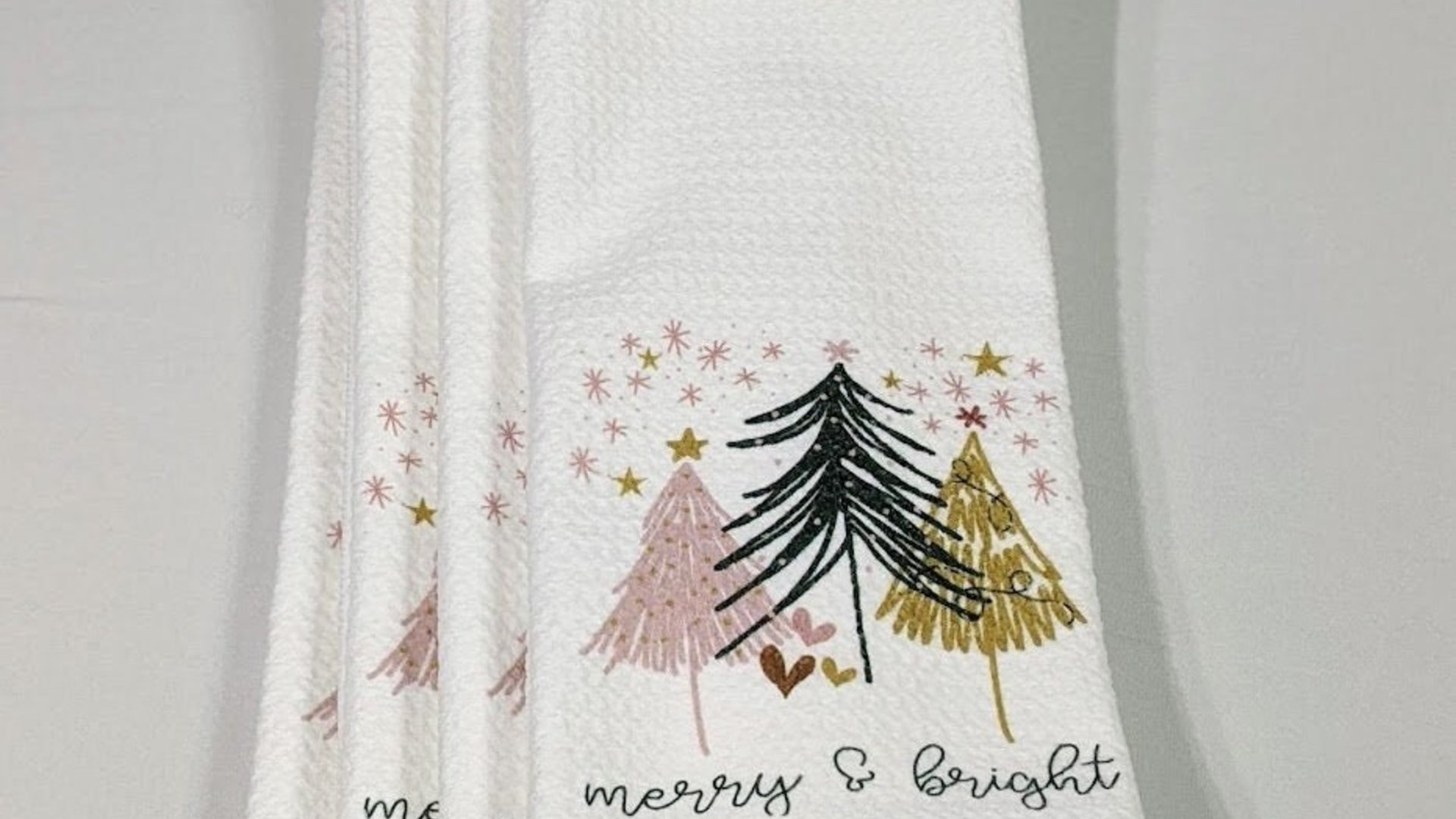 merry and bright kitchen towels for Christmas, blush pink Christmas tree hand towels for church, trending Christmas gifts for neighbors