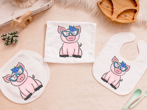 CapableByDesign pig baby bodysuit, bib, peanut burp cloth, and carry with me lovey blanket