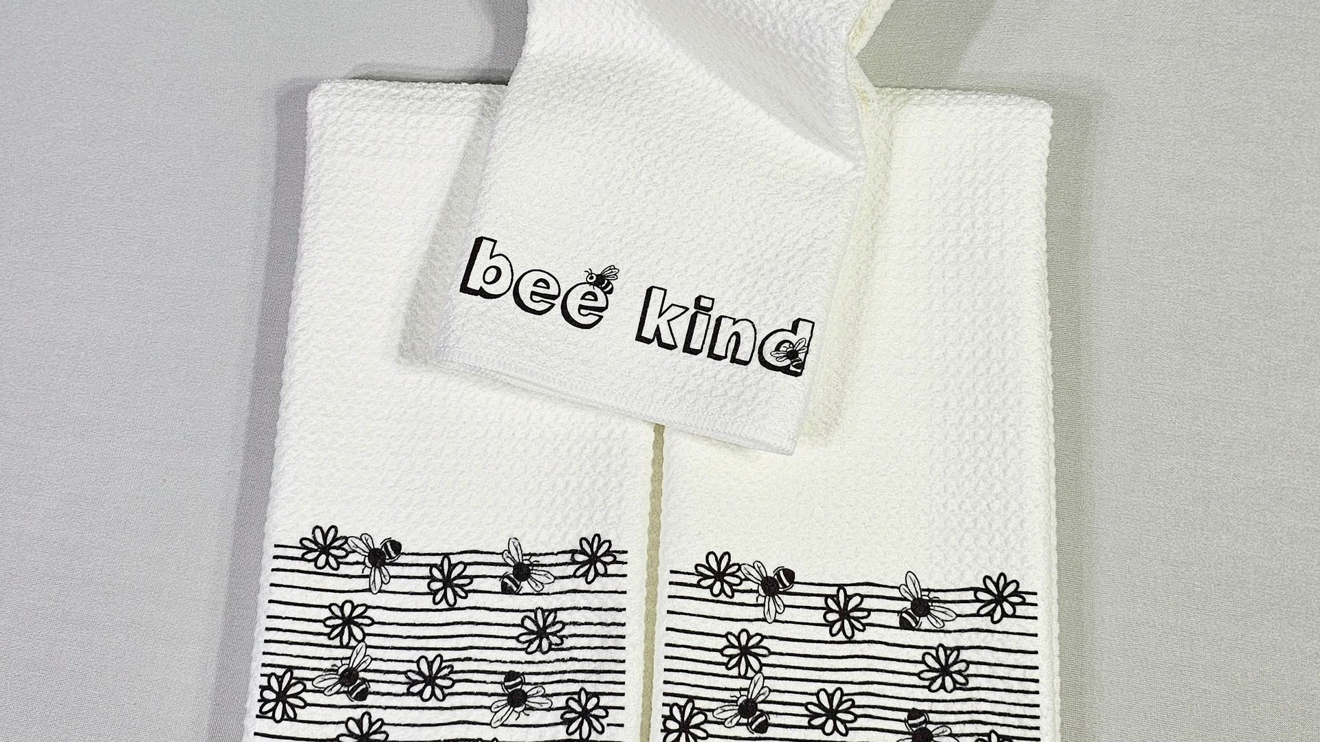 bee kind spring kitchen towels, honey bee gifts for women, bumble bee kitchen decor, black and white daisy hand towels for powder room, best