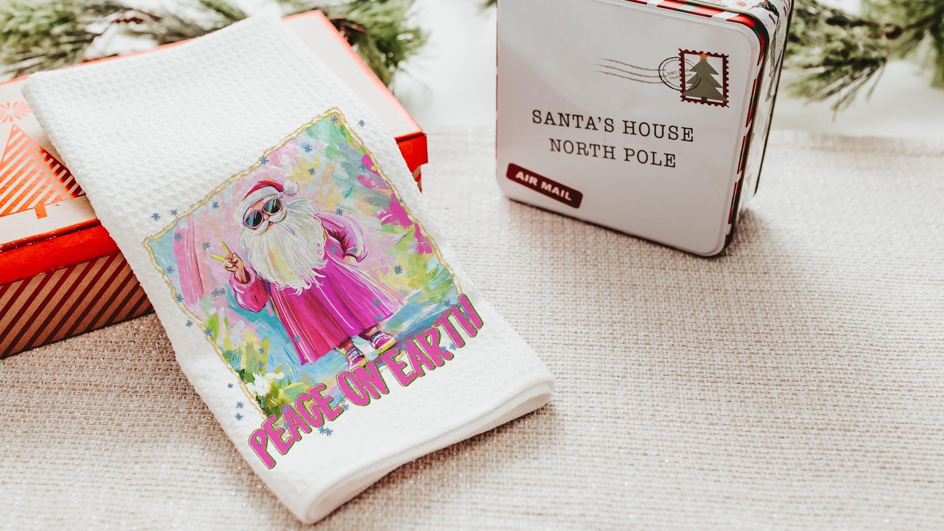 hippie Santa throw pillows for couch, peace on earth kitchen towels for Christmas, hot pink Santa Claus holiday hosting decor home decor