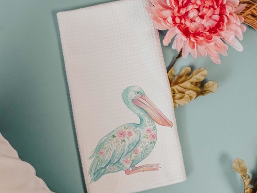 CapableByDesign floral pelican and floral shrimp throw pillows and matching towels