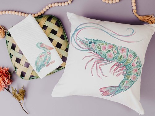 CapableByDesign floral pelican and floral shrimp throw pillows and matching towels