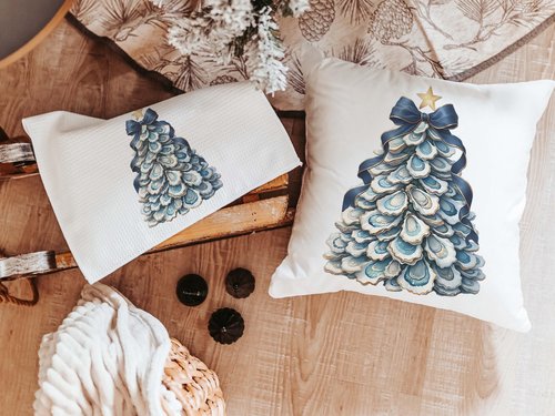 CapableByDesign oyster shell Christmas tree with navy bow pillows and matching towels