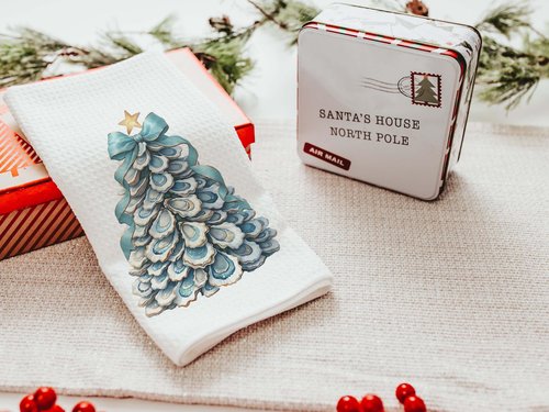 CapableByDesign oyster shell Christmas tree with aqua bow pillows and matching towels