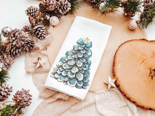 CapableByDesign oyster shell Christmas tree with aqua bow pillows and matching towels