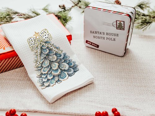 CapableByDesign oyster shell Christmas tree with polka dot bow pillows and matching towels