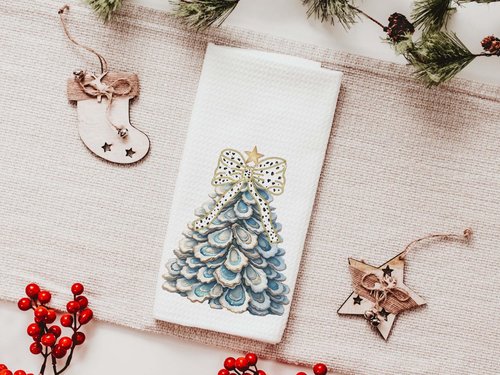 CapableByDesign oyster shell Christmas tree with polka dot bow pillows and matching towels