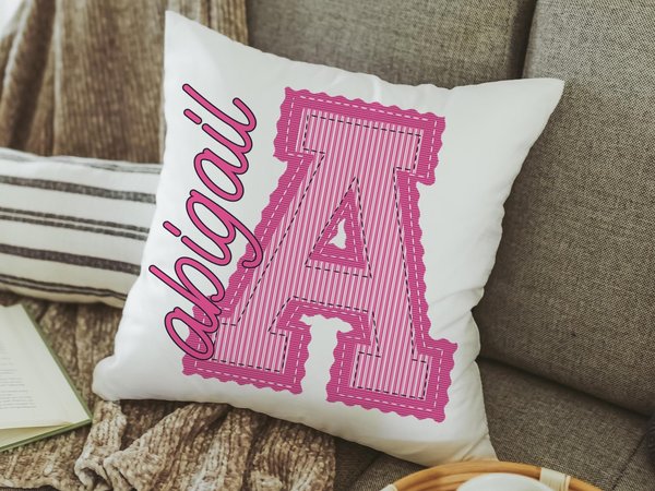 Personalized pink seersucker initial pillow with name 